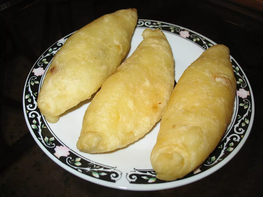 Carimanola - a yuka fritter stuffed with meat and cheese.