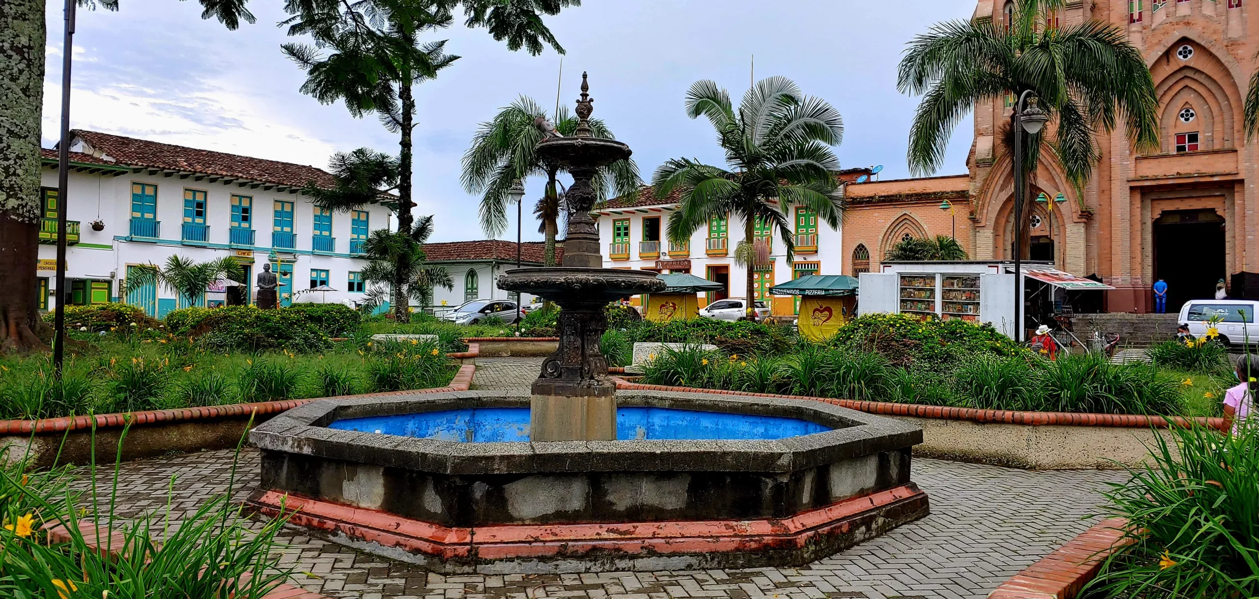 Fountain in the center of Plaza de Bolivar in Marsella, Colombia. Fountain in the center of Plaza de Bolivar in Marsella, Colombia.